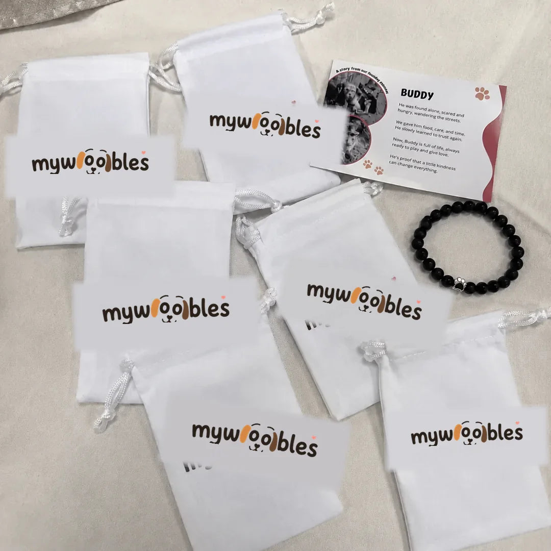 mywoobles order with pouches, bracelet and card photographed by a customer